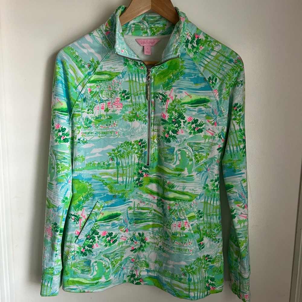Beautiful and bright spring pullover with 2 pockets and front half zip